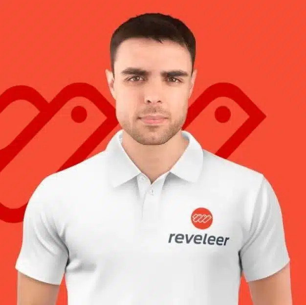 A man with short dark hair stands against an orange background wearing a white polo shirt with the "reveleer" logo on the left side. The background also features a larger, stylized version of the brand's logo.