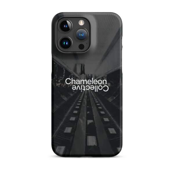 A sleek Snap case for iPhone® displaying a black and white image of an escalator in an urban setting. At the center, the words "Chameleon Collective" are written in white text, upside down. This snap case covers all sides of the phone, including the camera area, making it a stylish iPhone accessory.